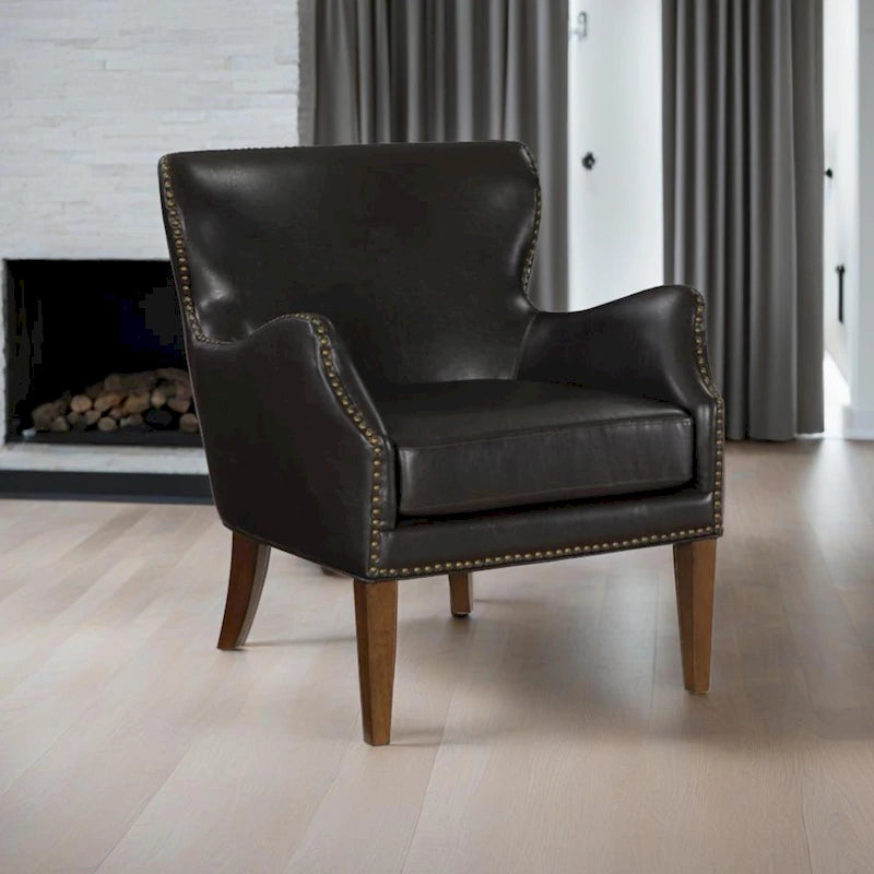 Fauteuil d'appoint dossier haut en similicuir marron, accoudoirs inclinés, une place